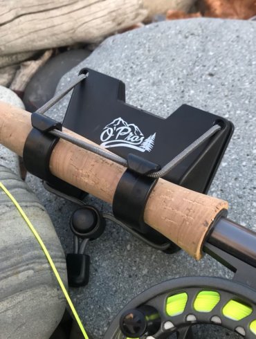 This photo shows the O'Pros 3rd Hand Rod Holder attached to a fly fishing rod.