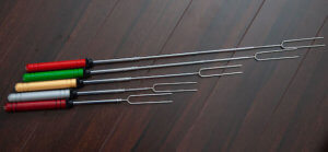 This camping gift photo shows the Rolla Roaster campfire roasting forks.