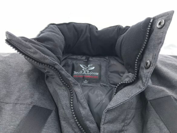 This photo shows the Triple F.A.T. Goose Norden Hooded Bomber Jacket with the hood zipped off.