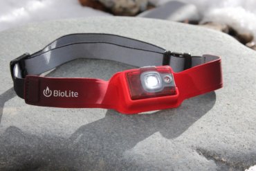 This photo shows the BioLite HeadLamp 200 headlamp with the light on.