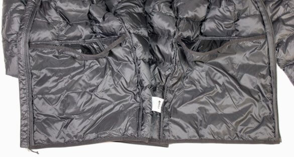 This photo shows the two interior stash pockets on the REI Co-op 650 Down Jacket 2.0.