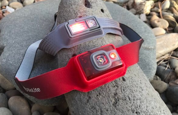 This photo shows the BioLite HeadLamp 200 next to the HeadLamp 330 red light mode.