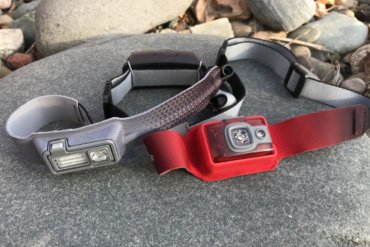 This photo shows the BioLite HeadLamp 200 next to the HeadLamp 330.