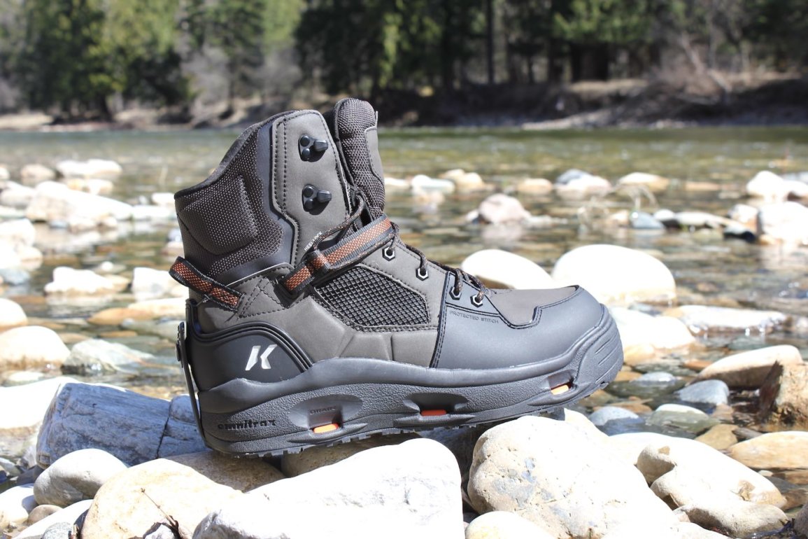 This review photo shows the Korkers Terror Ridge wading boots on rocks near a river.