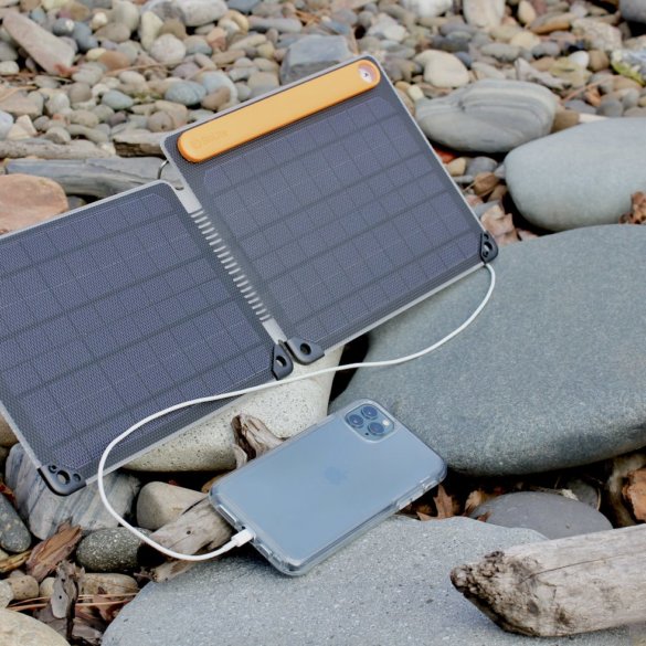 This review photo shows the BioLite SolarPanel 10+ charging a smartphone in the sun.
