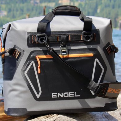 This best soft cooler photo shows a closeup of a soft-sided cooler being tested for review outside near a lake.