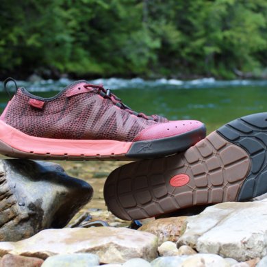 This review photo shows the Chaco Torrent Pro Water shoes next to a river.
