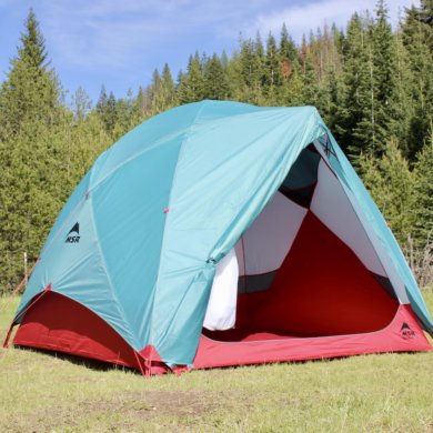 This testing and review photo shows the MSR Habitude 4 Tent sent up at a camping site.