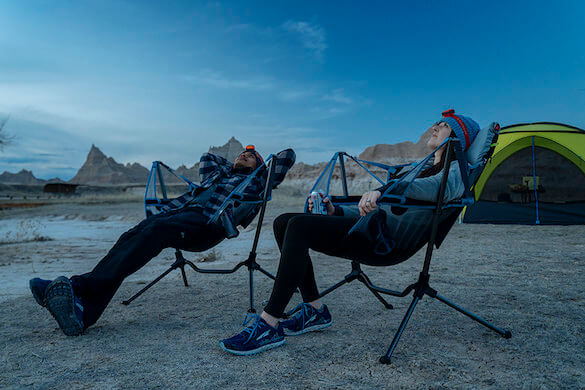 This photo shows the Nemo Stargaze Recliner Luxury Chair camping gift in use while out camping.