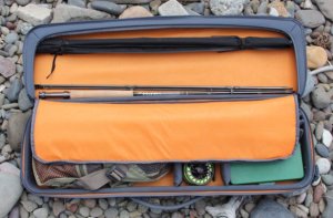 This fly fishing gift buying guide photo shows the Orvis Safe Passage Carry It All fly rod and reel travel case.