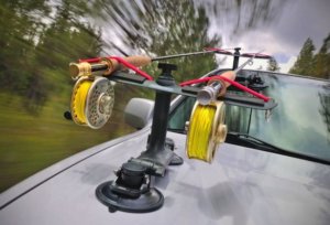 This fly fishing gift photo shows the Rodmounts Sumo Car-Top Fishing Rod Mounting system installed on a vehicle.