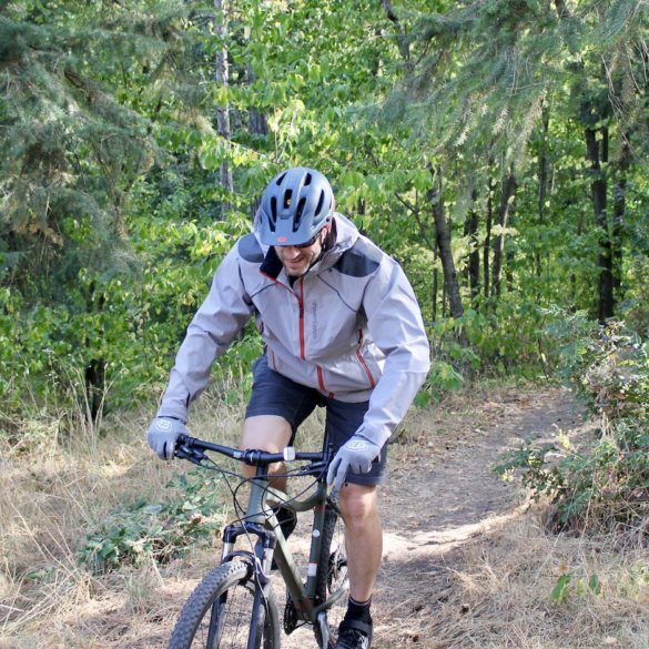 This photo shows the author wearing the Showers Pass Elements Jacket during testing during the mountain biking review process.