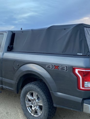 This review photo shows the Fas-Top Travel Package installed on a Ford F-150 pickup with the soft topper up.