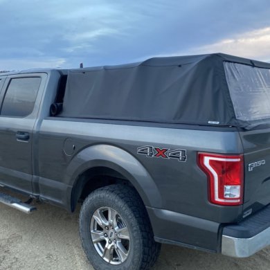 This review photo shows the Fas-Top Travel Package installed on a Ford F-150 pickup with the soft topper up.