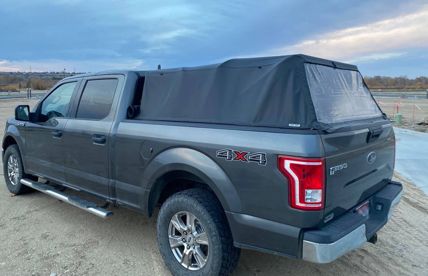 This review photo shows the Fas-Top Travel Package installed on a Ford F-150 pickup with the soft topper up.