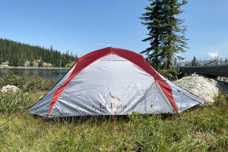 This review photo shows the L.L.Bean Mountain Light HV 3 Tent set up near a backcountry mountain lake during testing.