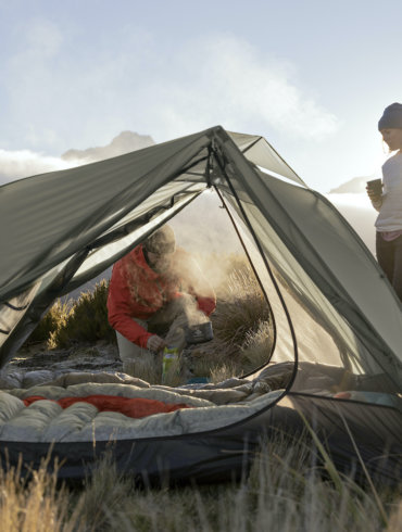 This photo shows the Sea to Summit Alto TR2 tent pitched outside in the mountains.