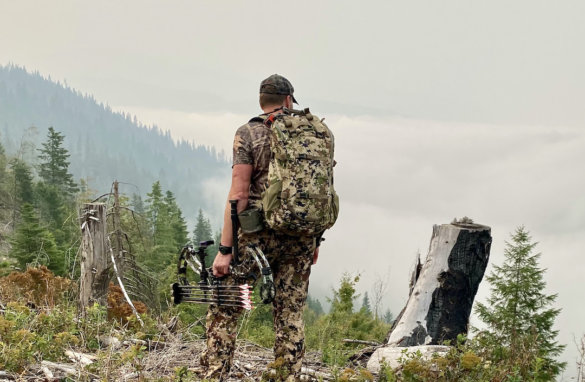 This review photo shows the author wearing the Mystery Ranch Sawtooth 45 backpack while archery elk hunting in Idaho.