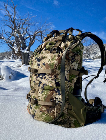 This review photo shows the Mystery Ranch Sawtooth 45 hunting backpack outside on a Nevada mountain during testing while hunting for elk.