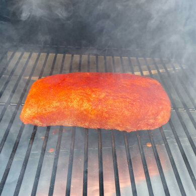 Pork loin cooking on Traeger Pro 575 Pellet Grill during the review process.
