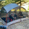 This testing and review photo shows the Bass Pro Shops Eclipse Refuge Screen House being used while camping.
