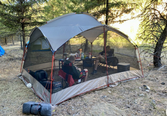 This review photo shows the Bass Pro Shops Eclipse Refuge Screen House during the testing and review process on a camping trip.