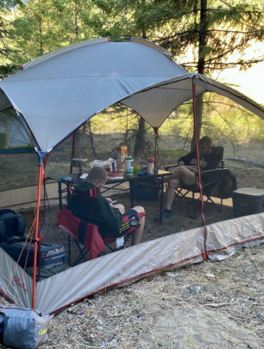 This testing and review photo shows the Bass Pro Shops Eclipse Refuge Screen House being used while camping.