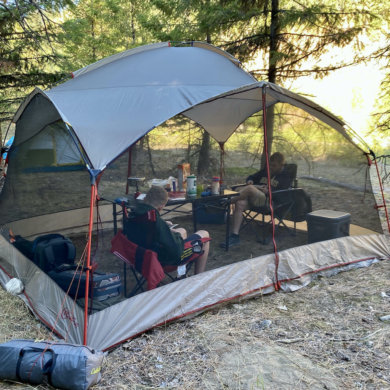 This testing and review photo shows the Bass Pro Shops Eclipse Refuge Screen House being used while camping.