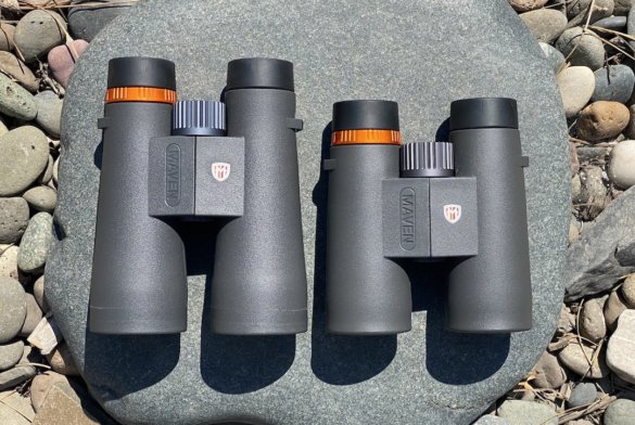 This testing and review photo shows the Maven C.3 10x50 binoculars side-by-side with the Maven C.1 10X42 binoculars.