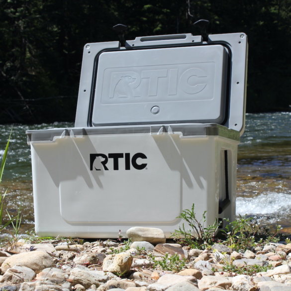 This review photo shows the RTIC Ultra-Light Cooler outside near a river just prior to the testing process by the author.