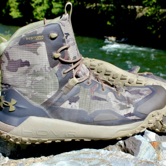 This review photo shows the Under Armour UA HOVR Dawn WP Boots on a rock during the initial testing phase by the author.