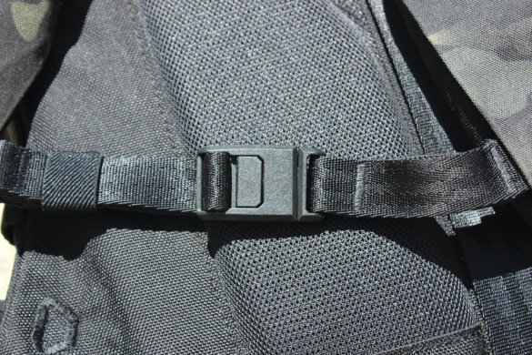 This photo shows the magnetic chest strap on the Able Carry Max Backpack.