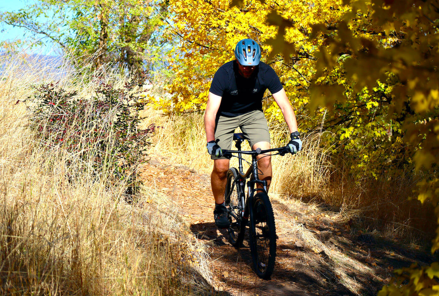 This photo shows the author wearing the Showers Pass Apex DWR 12" Shorts on a mountain biking ride.