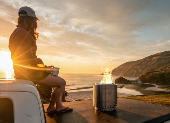 This photo shows the Solo Stove Ranger Fire Pit near a beach.