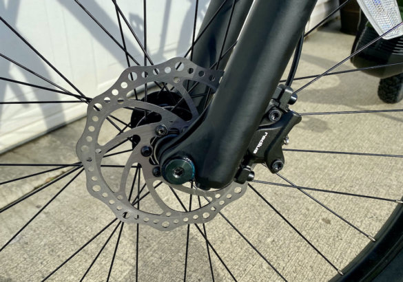 This photo shows the front brakes on the Vvolt Sirius ebike.