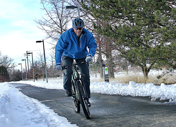 This photo shows the author test riding the Vvolt Sirius ebike.