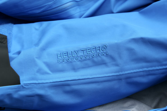 This photo shows the Helly Hansen Odin 9 Worlds 2.0 Jacket sleeve in a closeup of the Helly Tech Professional stitching.