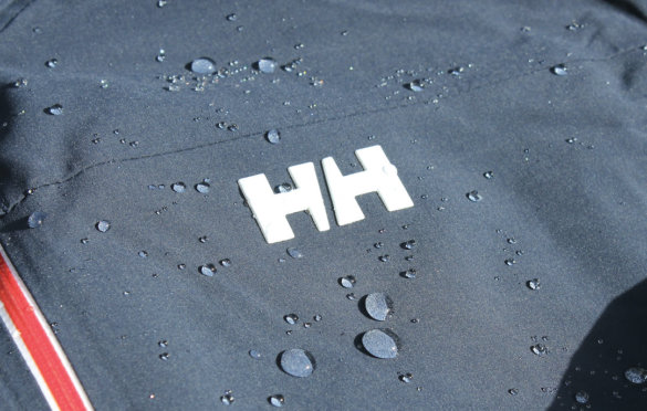 This photo shows water beaded up on the outside of the Helly Hansen Alpha Lifaloft Jacket.