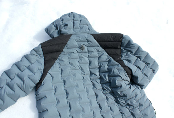 This photo shows the shoulder panels on the Stio Skillet Stretch Down Hooded Jacket.