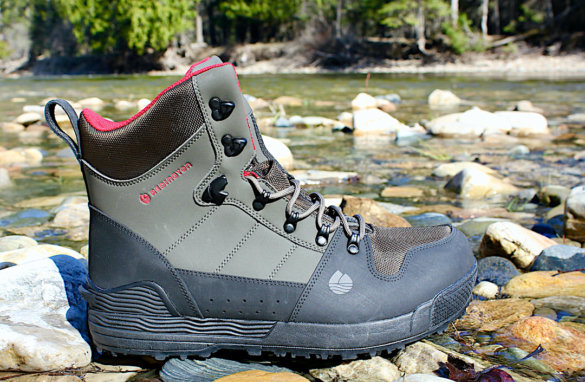 This wading boot buying guide review photo shows the Redington PROWLER-PRO Wading Boot near a river.