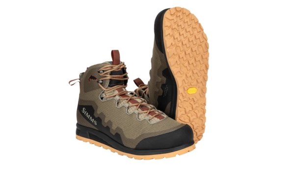 This best wading boot buying guide photo shows the new Simms Flyweight Access Wading Boots with the new grippy Vibram Idrogrip Flex rubber outsole.