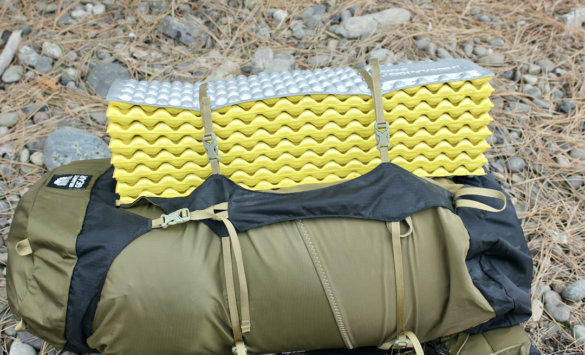 This photo shows the bulky packed size of a Therm-a-Rest Z Lite SOL Sleeping Pad.
