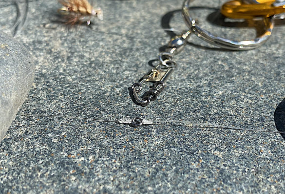 This photo shows tippet rings on a snap swivel.