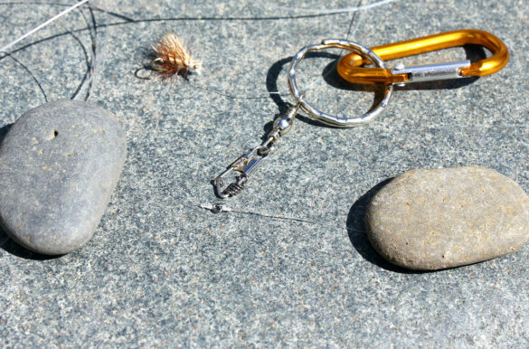 This photo shows a fly fishing tippet ring attached to a fly fishing leader and tippet material.
