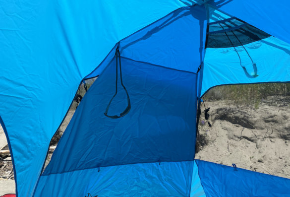 This photo shows the L.L.Bean Sunbuster Folding Shelter interior when setup on a beach during the review period.