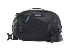 This photo shows the new Patagonia Guidewater Hip Pack 9L waterproof fly fishing waist pack.
