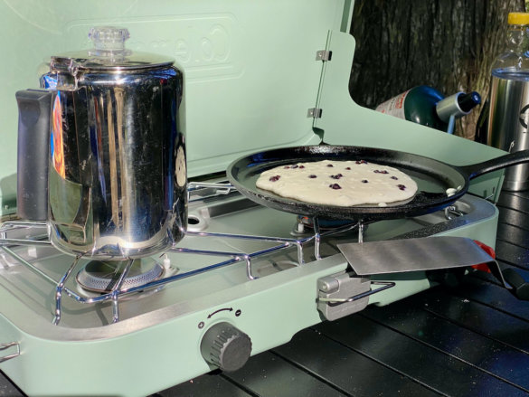 This photo shows a pancake cooking on the Coleman Cascade 2-Burner Camping Stove during the testing process.