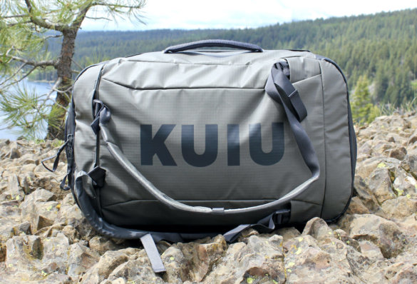 This review photo shows the KUIU Waypoint 2800 Duffel outside on a rocky outcropping. 