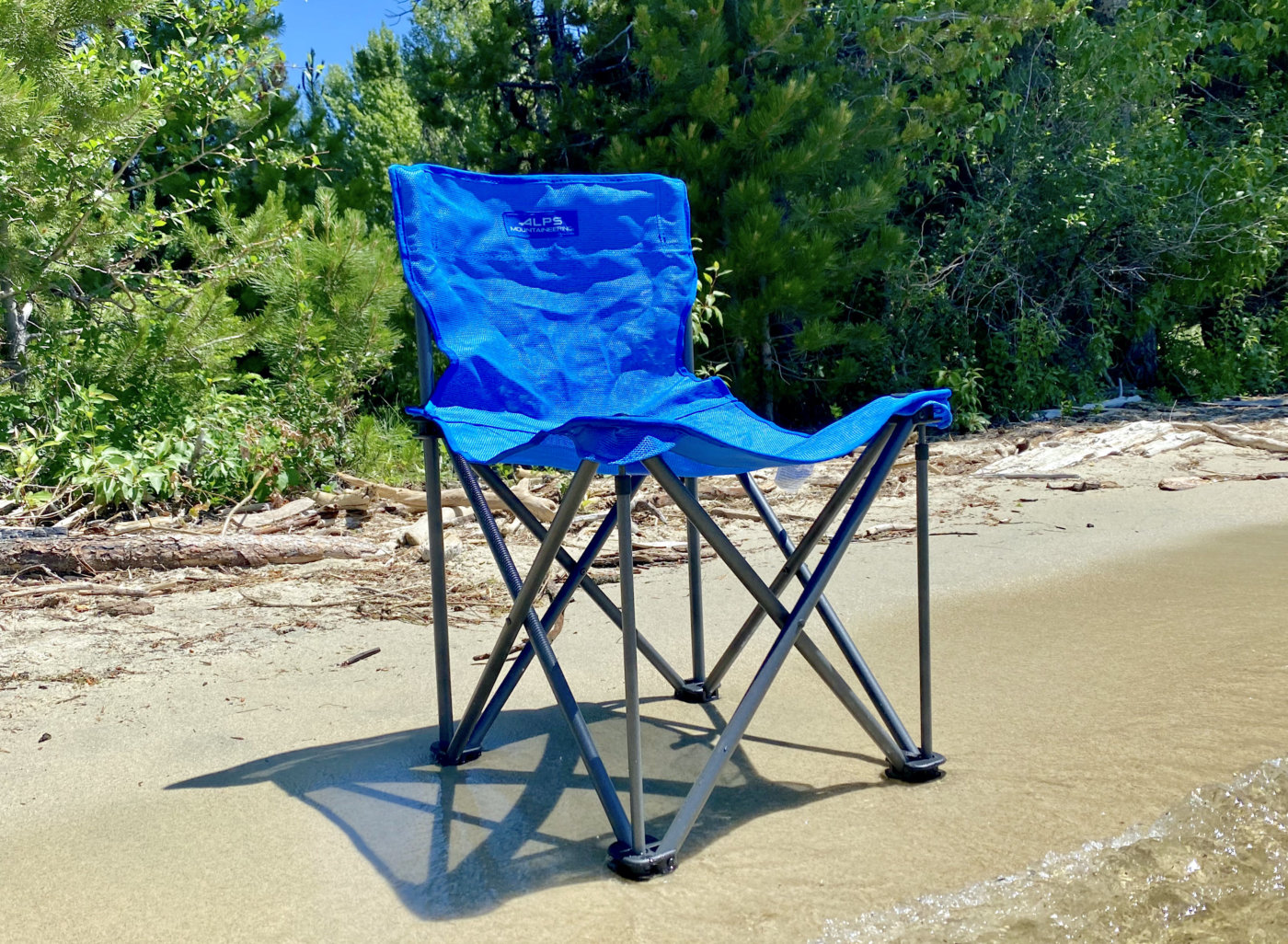 This photo shows the ALPS Mountaineering Adventure Chair at the beach during the testing and review process.