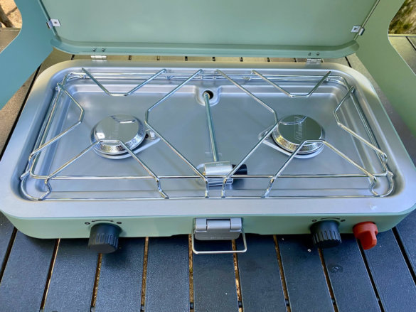 This photo shows the interior of the Coleman Cascade 2-Burner Camping Stove.